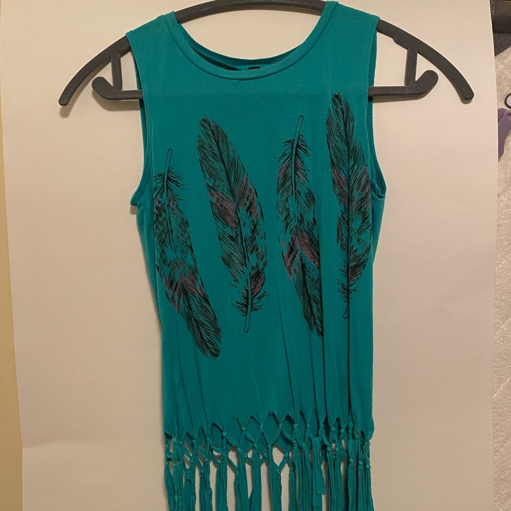 blue green shirt, pink/black feathers. ties